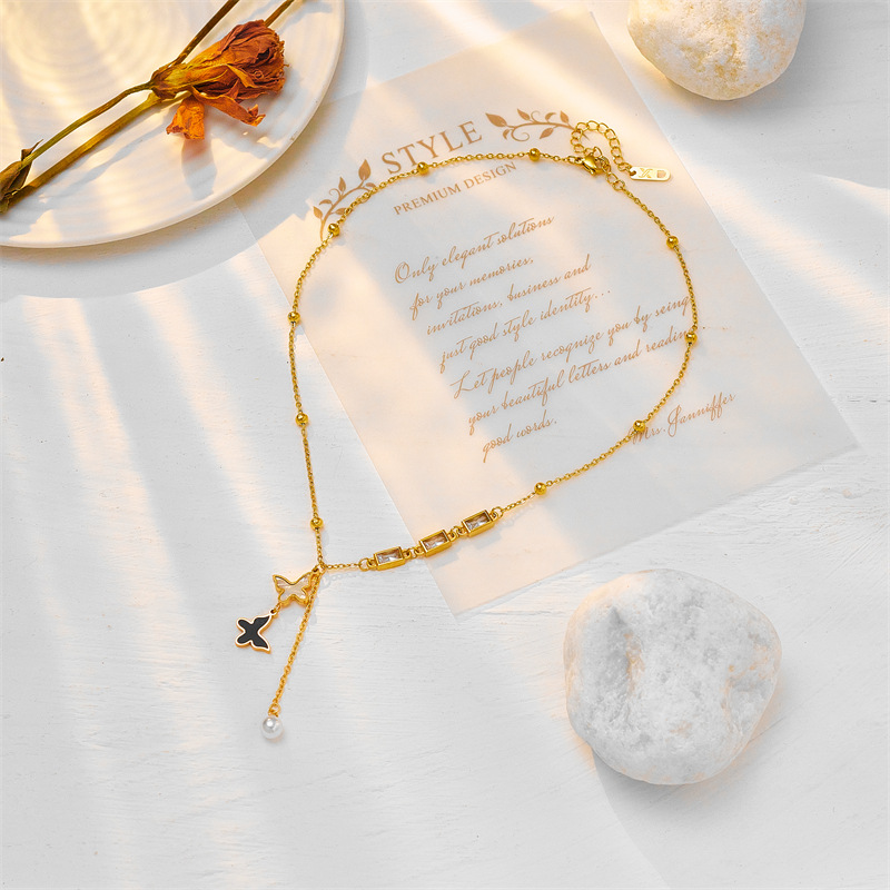 A high-end and light luxury titanium steel collarbone chain featuring a new European and American shell black and white butterfly square zircon tassel necklace Specification drawing