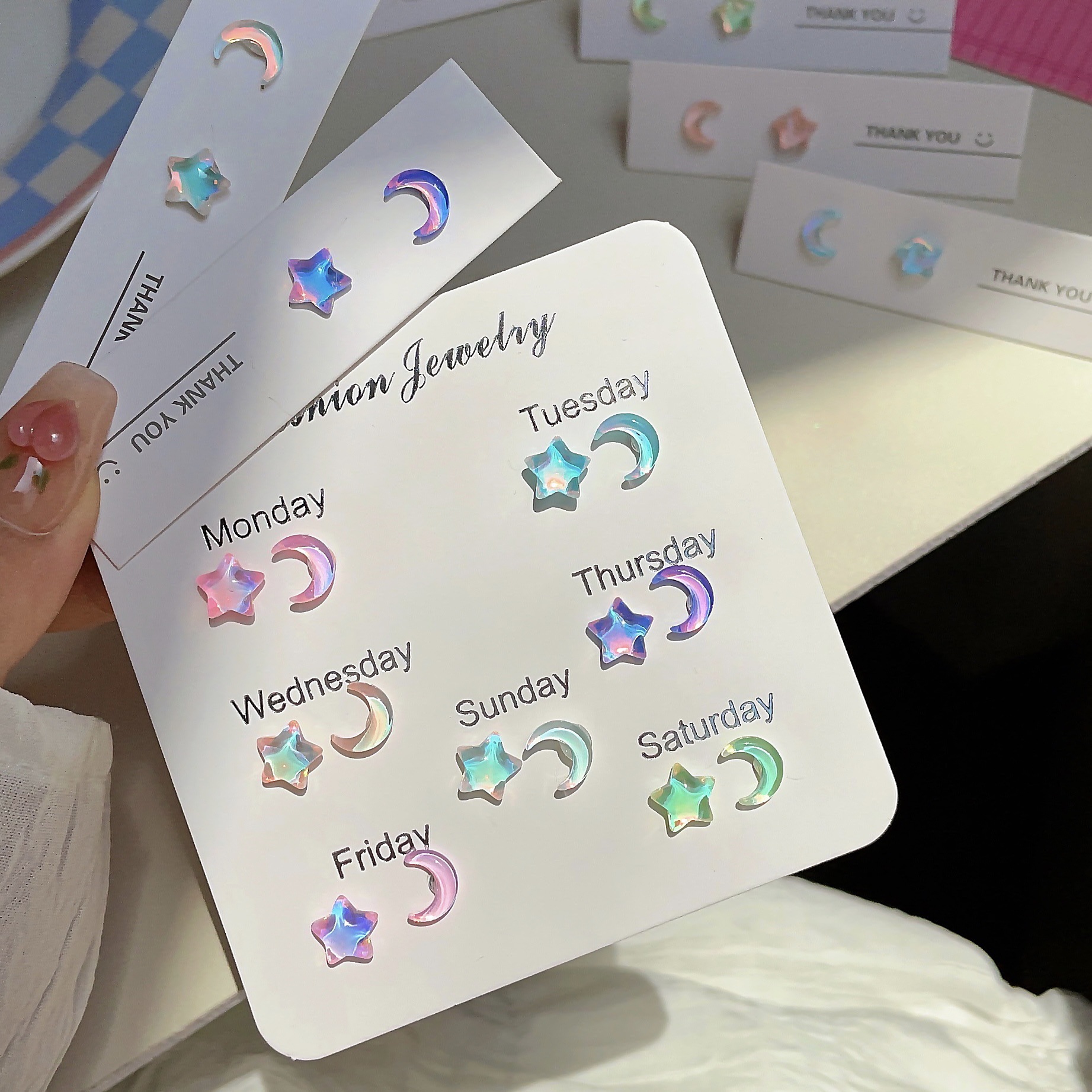 The fresh and delicate silver needle Mocha Star Moon girl ear studs are sweet, small, clear, super shiny and versatile ear piercing earrings full figure