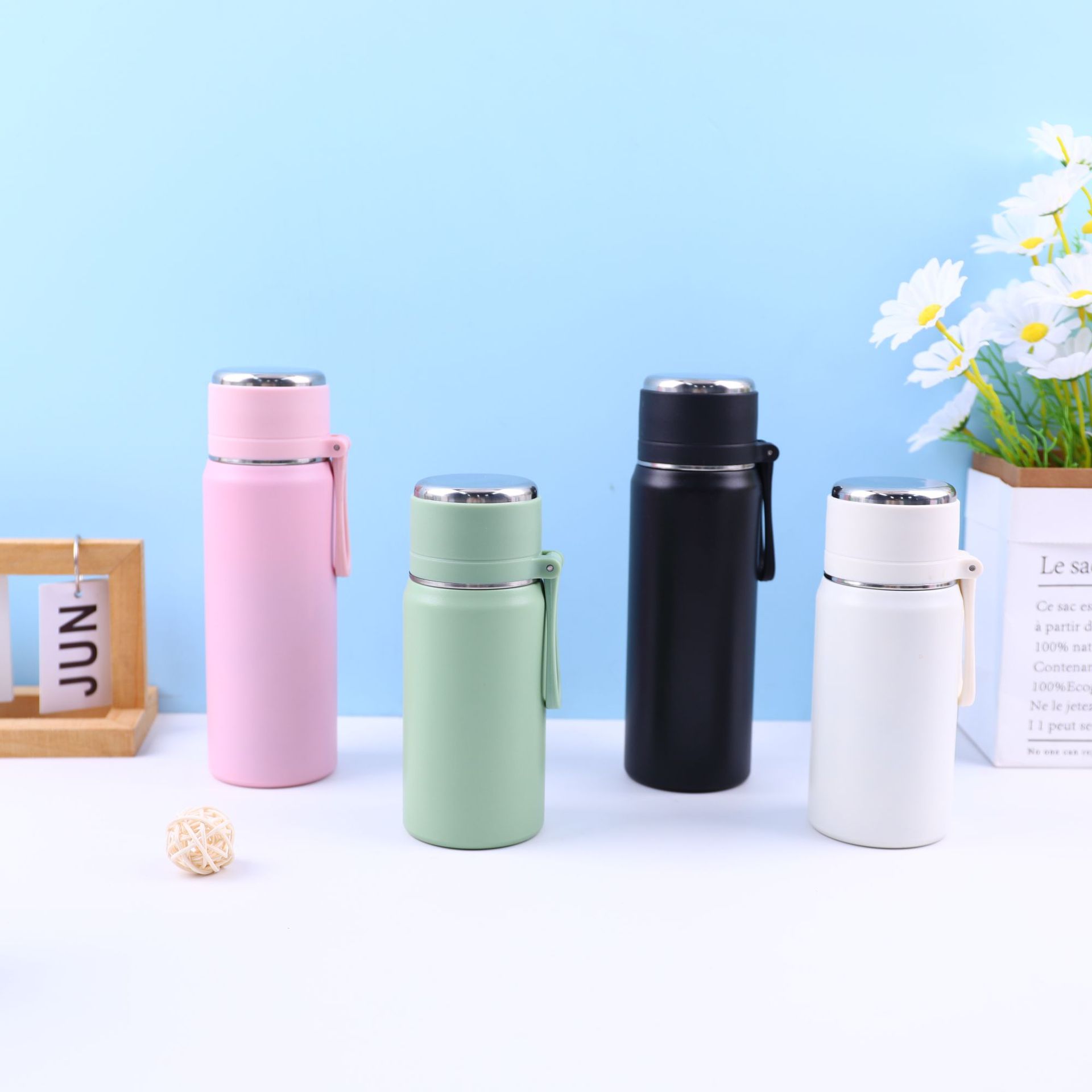 A new 316 stainless steel insulated cup with a fresh and clean style, featuring a double-layer portable water cup for students, men and women, and scholars full figure