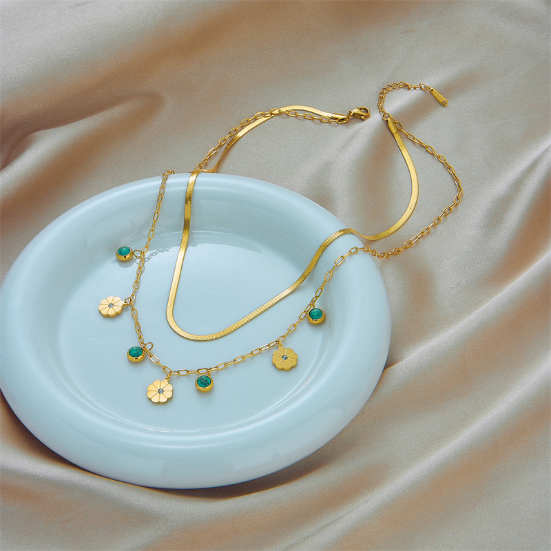 A cross-border fashionable and simple double-layer snake bone chain titanium steel turquoise small flower pendant accessory necklace from Europe and America details Picture