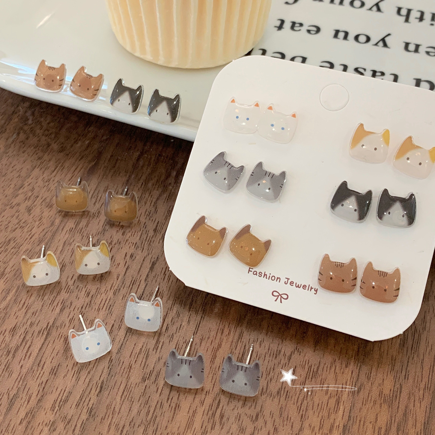 Japanese-style cute cat head ear stud silver needle set, cartoon resin small and exquisite design student earrings Application Scenario