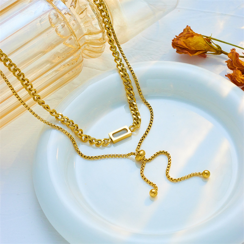 A high-end and simple double-layer titanium steel jewelry necklace with an irregular pull-out chain in a Korean style that is both fashionable and cold details Picture