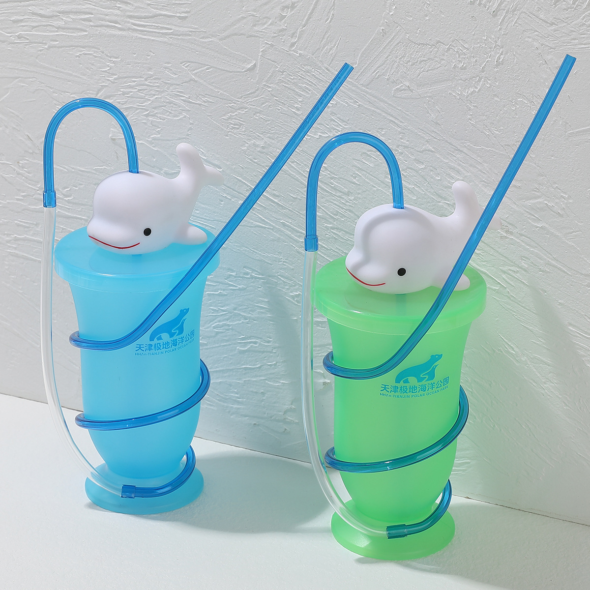 Wholesale of new best-selling straw cups, cartoon doll water cups, popular juice and milk tea drink cups, and dolphin water cups from the manufacturer details Picture