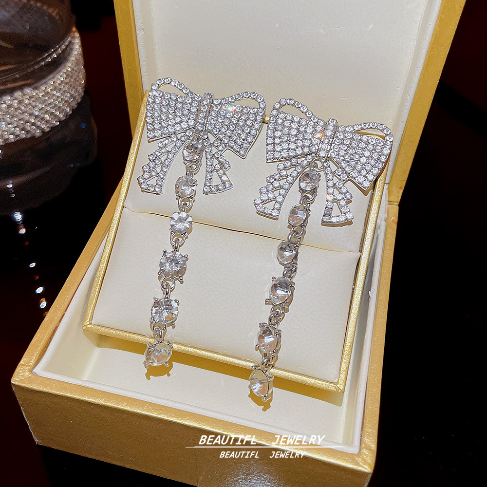 European and American style, exaggerated bow earrings, tassels, high-end feel, super dazzling, full of diamonds, light luxury earrings for socialites wholesale full figure