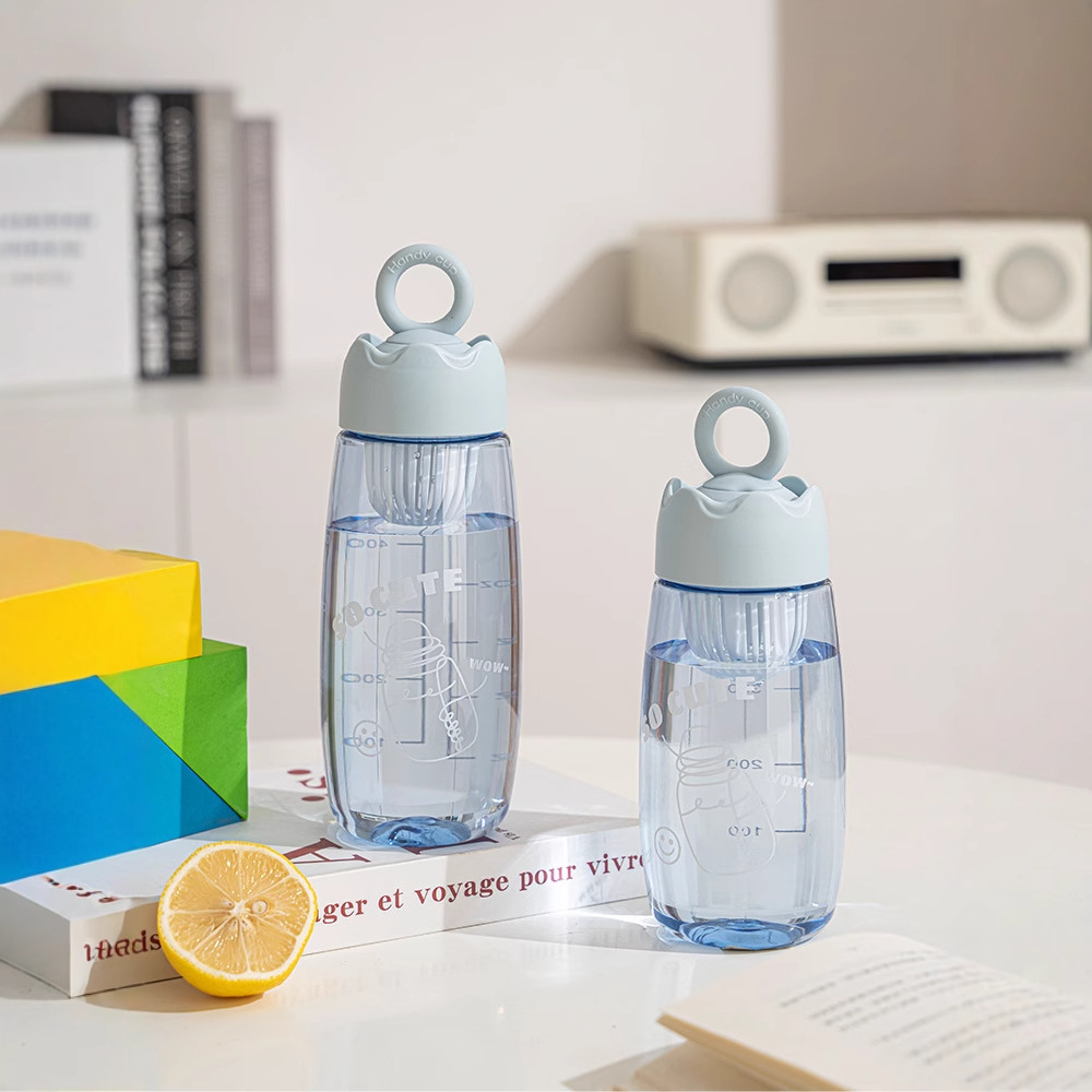 Creative and simple student plastic cups, outdoor portable sports water cups with tea strainers, high-temperature resistant space cups Application Scenario