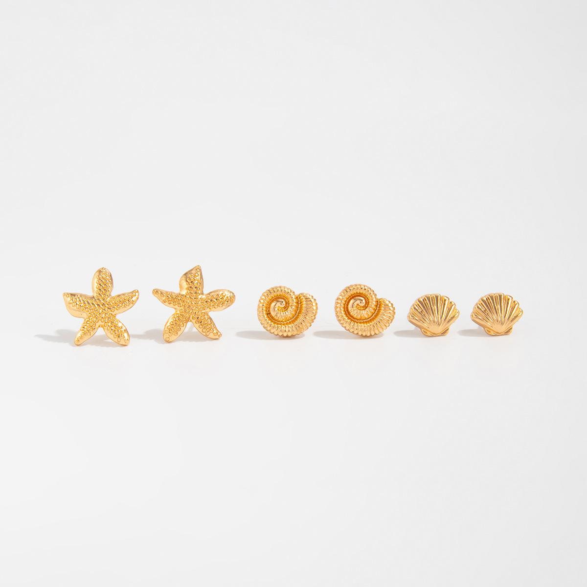 European and American ins cross-border vacation style flower starfish stud earrings set, sweet and cool light luxury small bow earrings accessory Application Scenario