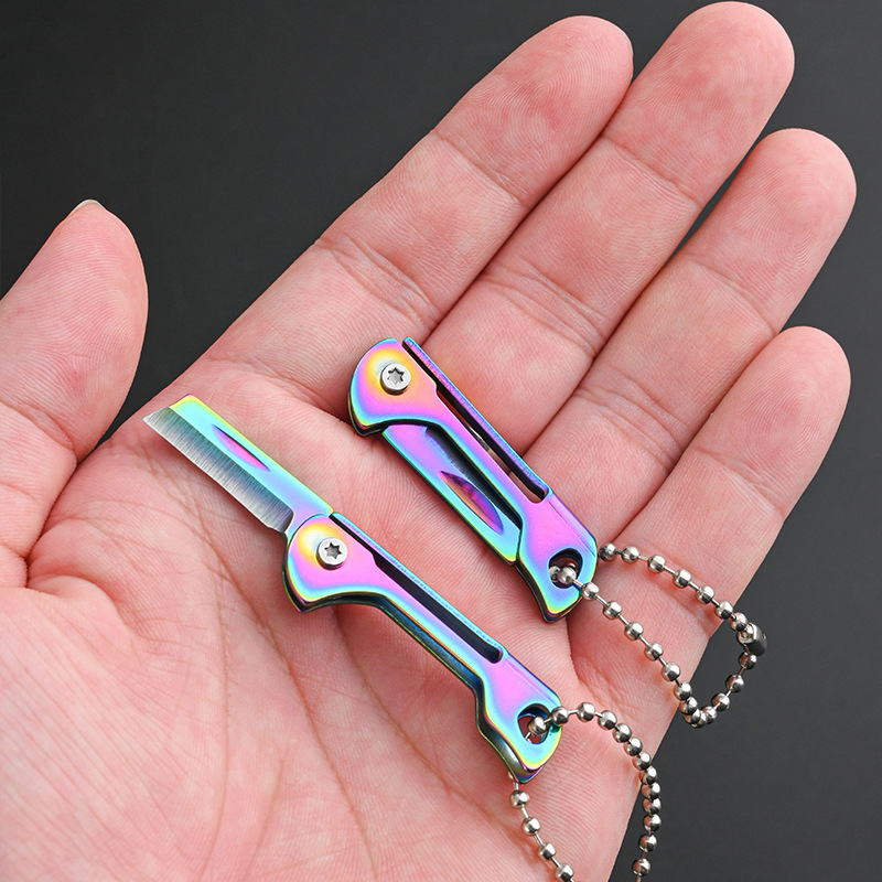 Stainless steel mini folding knife, portable folding knife, keychain pendant, a perfect tool for opening packages undefined
