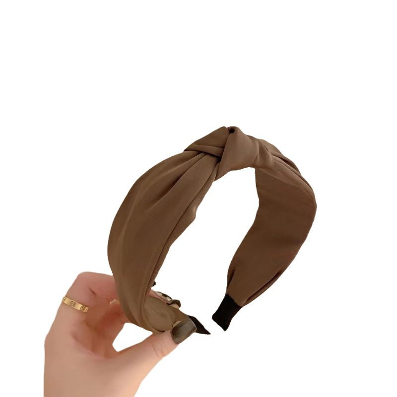 Solid-color wide-brimmed hairband for women, simple and elegant. Silk knot and hair pressing headband. Korean-style milk coffee-colored fabric headband Item Picture