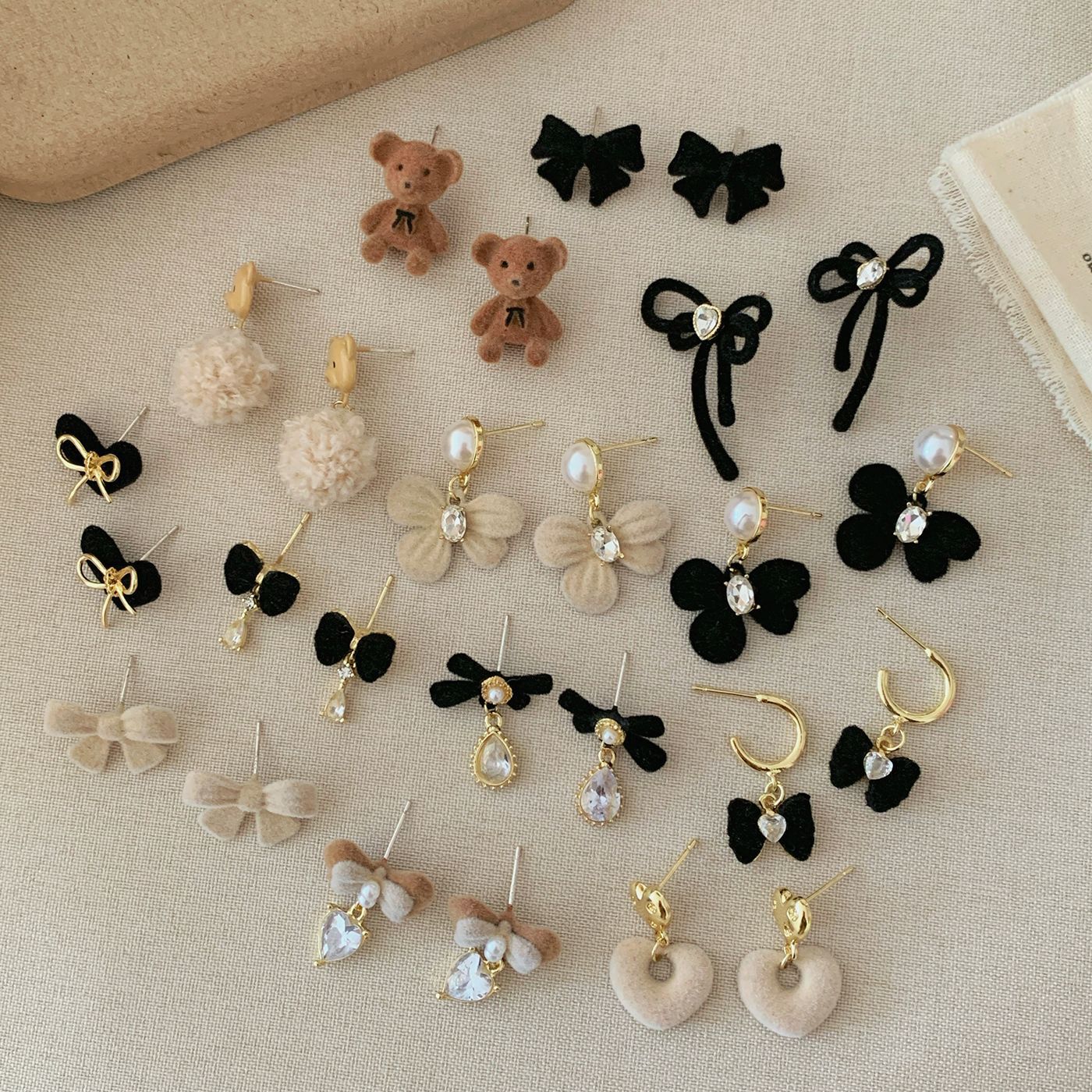 Winter black and brown flocked large earrings, women's silver needle, French retro exquisite bow, elegant earrings collection wholesale Application Scenario