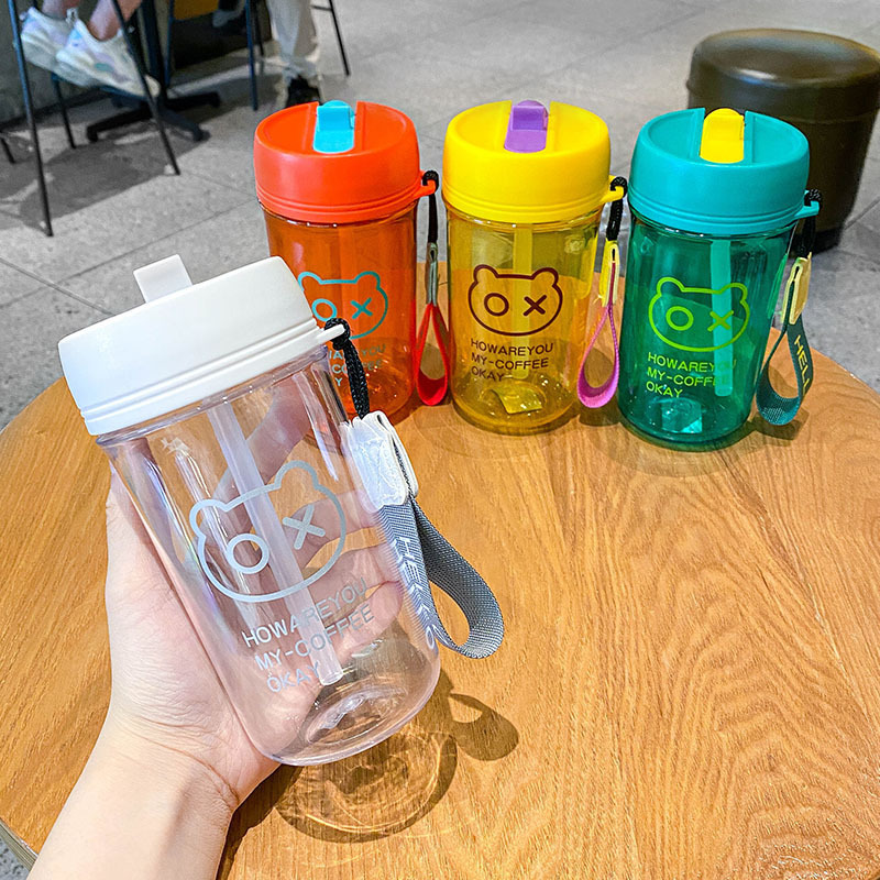 The popular plastic cup in the ins style is simple, trendy and fashionable. It is a portable hand-held cartoon student double drinking cup Application Scenario