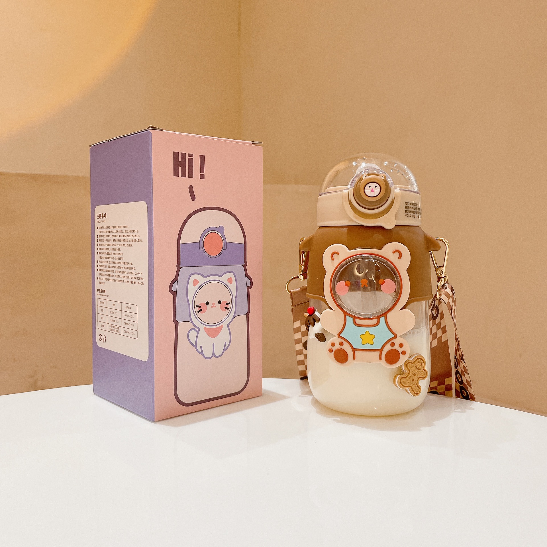 Cute children's straw cup, high-end and adorable doll drinking cup, anti-drop portable slanted cross pop-up cap baby plastic cup Application Scenario