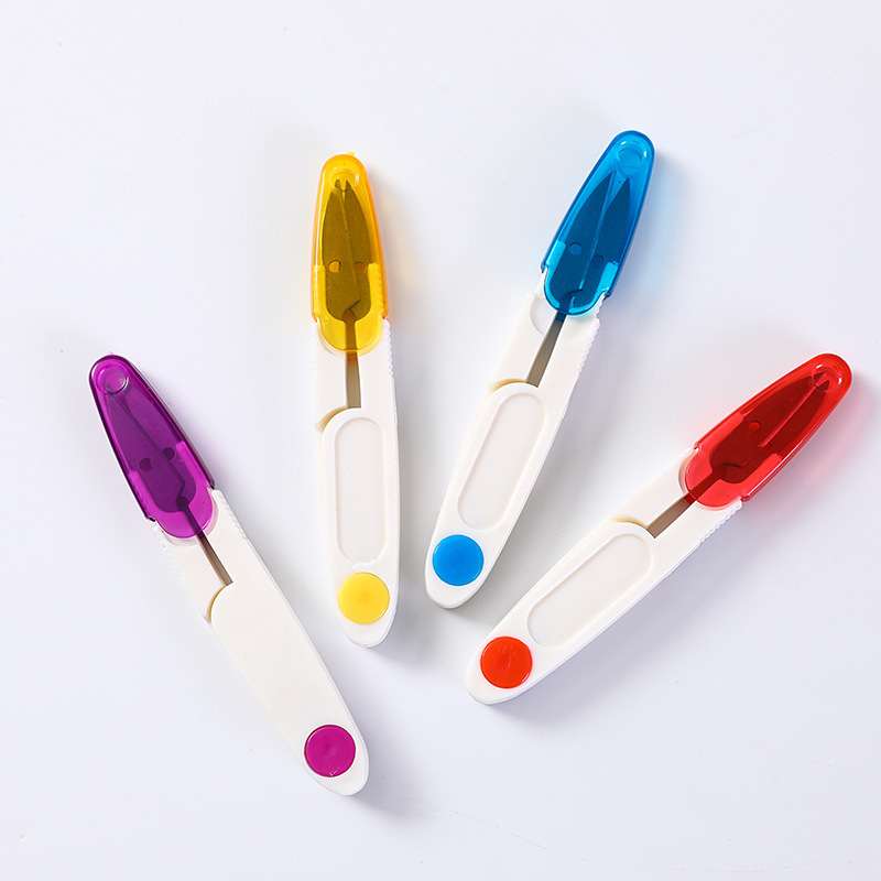 Wholesale of cross-stitch small scissors, transparent cover thread end scissors, safety sewing scissors, household U-shaped plastic spring yarn scissors details Picture