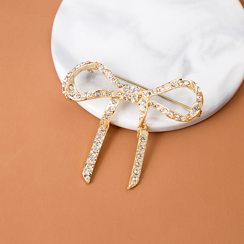 Cross-border new brooch accessories, retro alloy bows, diamond-encrusted exaggerated clothing accessories, pins, and clothing accessories full figure