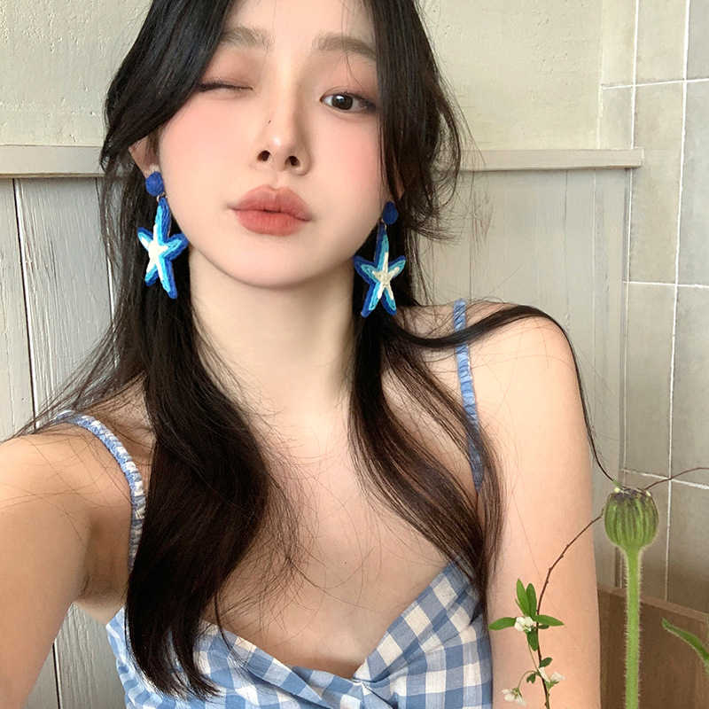 Spring and summer vacation style blue starfish earrings for women, light luxury, niche and high-end style earrings, elegant and grand stud earrings full figure