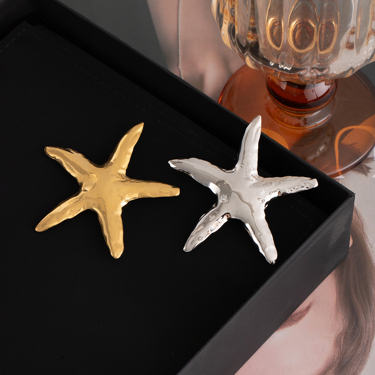 European and American stainless steel metal vacation-style brooch, silver starfish, seaside creative, high-end, fashionable and niche brooch details Picture