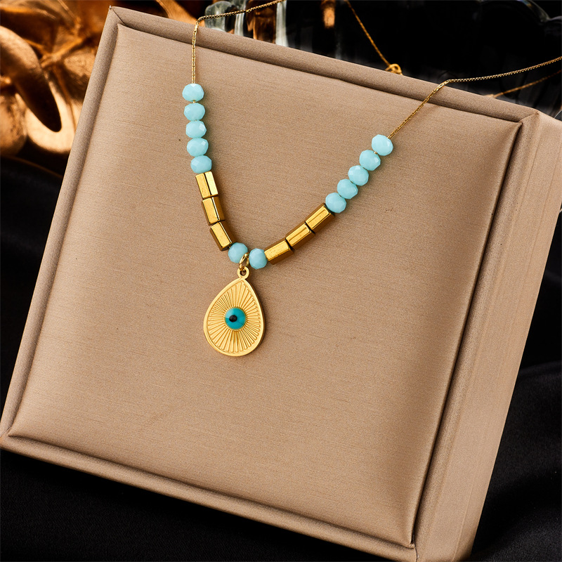 European and American cross-border fashion, simple, niche and retro blue eye water drop pendant, cut surface beaded titanium steel chain necklace full figure