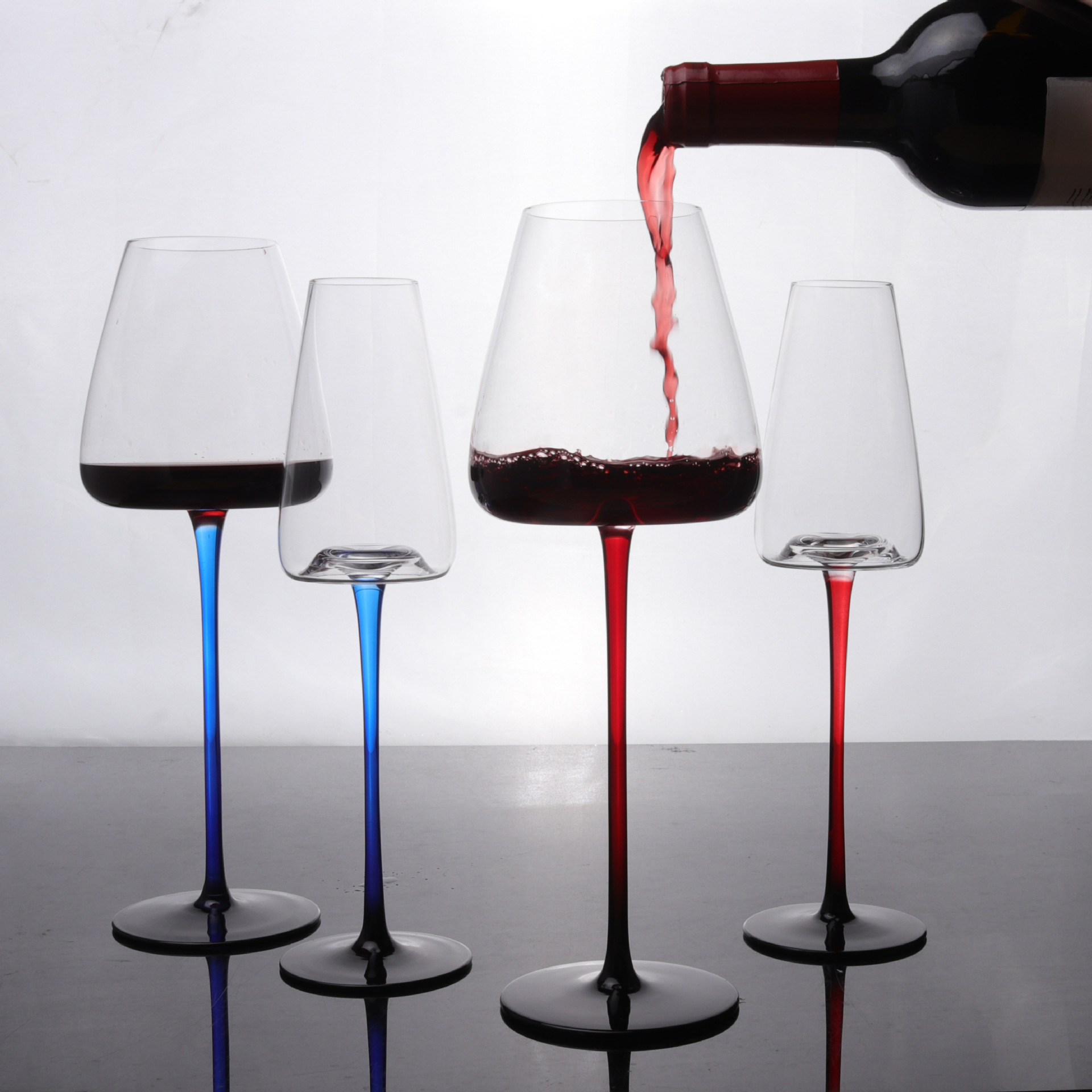 A variety of large Burgundy household red stem, black bottom, concave bottom red wine glasses, champagne glasses, black bow tie, and crystal red wine glasses details Picture