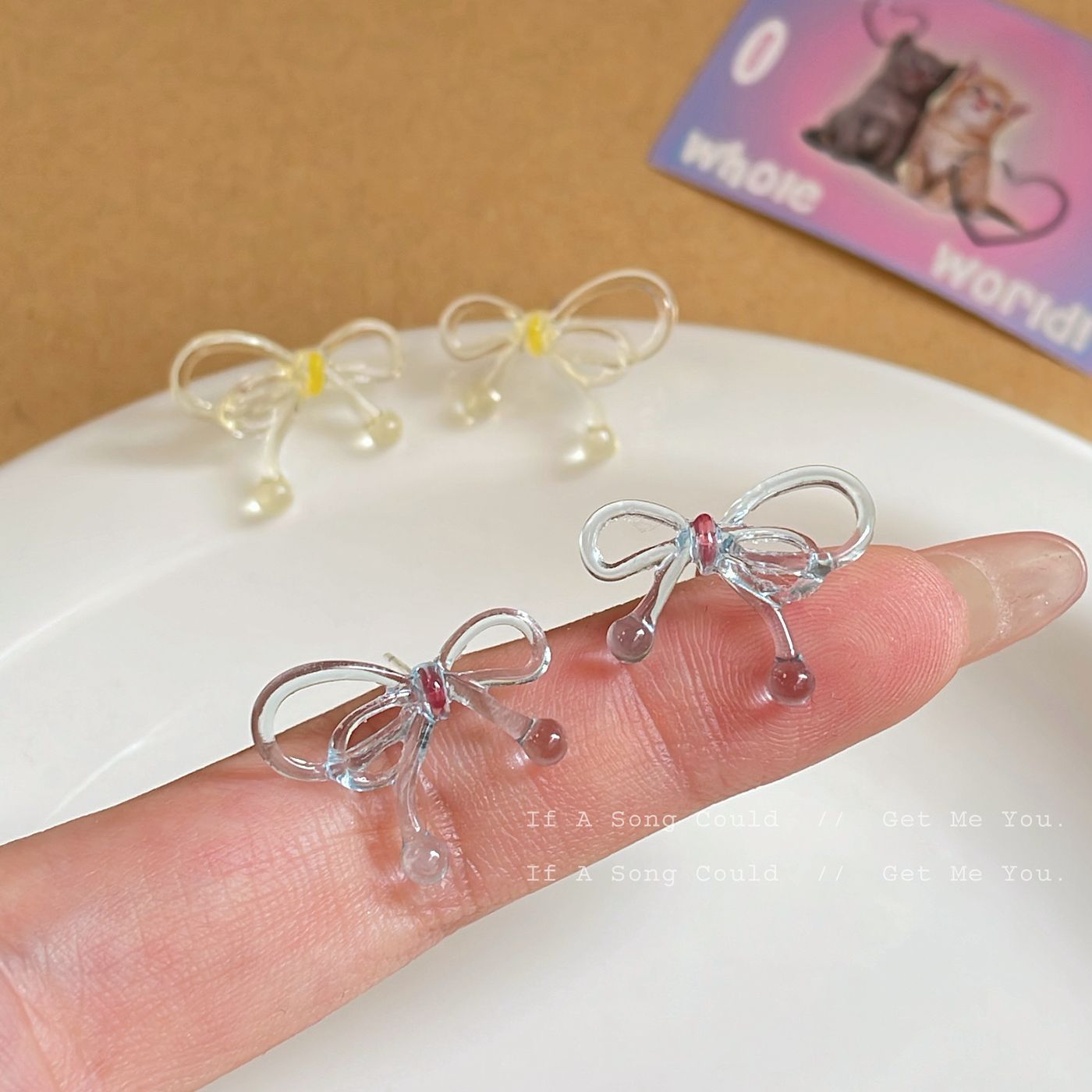 Korean summer acrylic transparent color-blocking bow earrings 925 silver needle new sweet and fresh girl stud earrings Specification drawing
