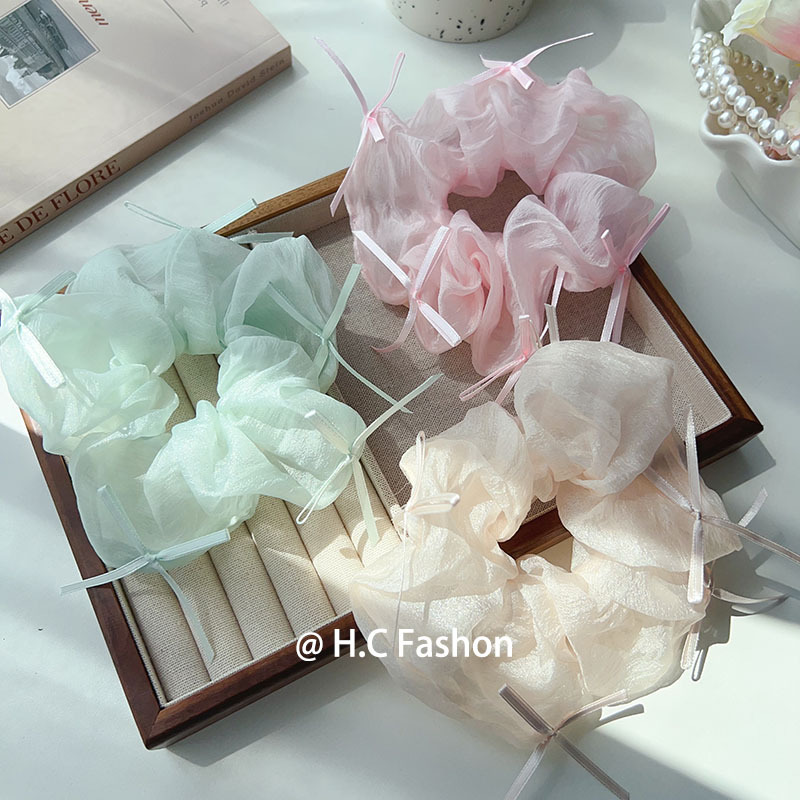 A fresh and simple cream puff, bow tie, large intestine hair band, high appearance level, simple candy-colored women's ponytail tie, and leather band accessory Application Scenario