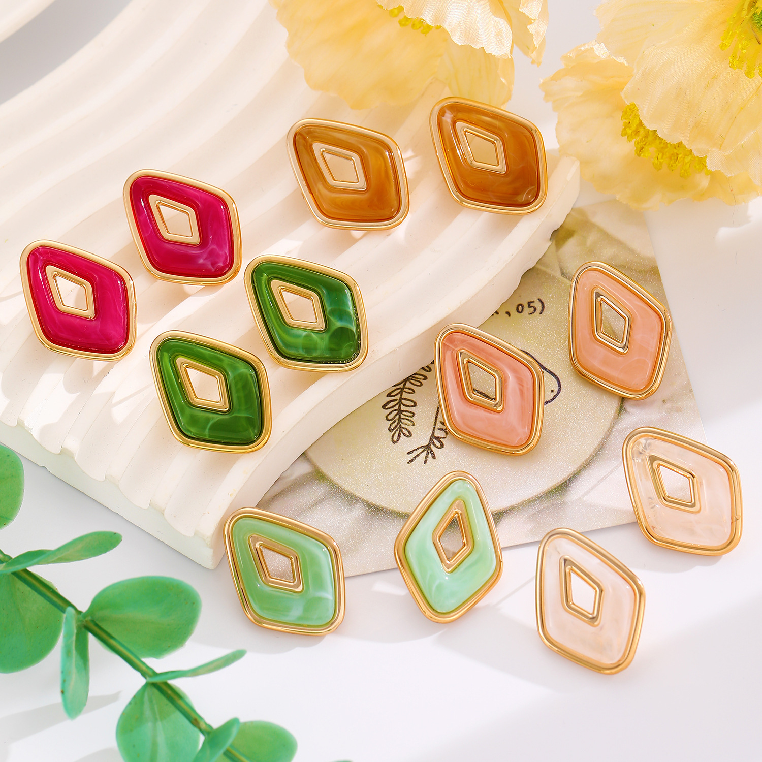 European and American cross-border hollowed-out diamond-shaped geometric ear studs, simple, fashionable and elegant, niche design earrings, women's summer dopamine Application Scenario