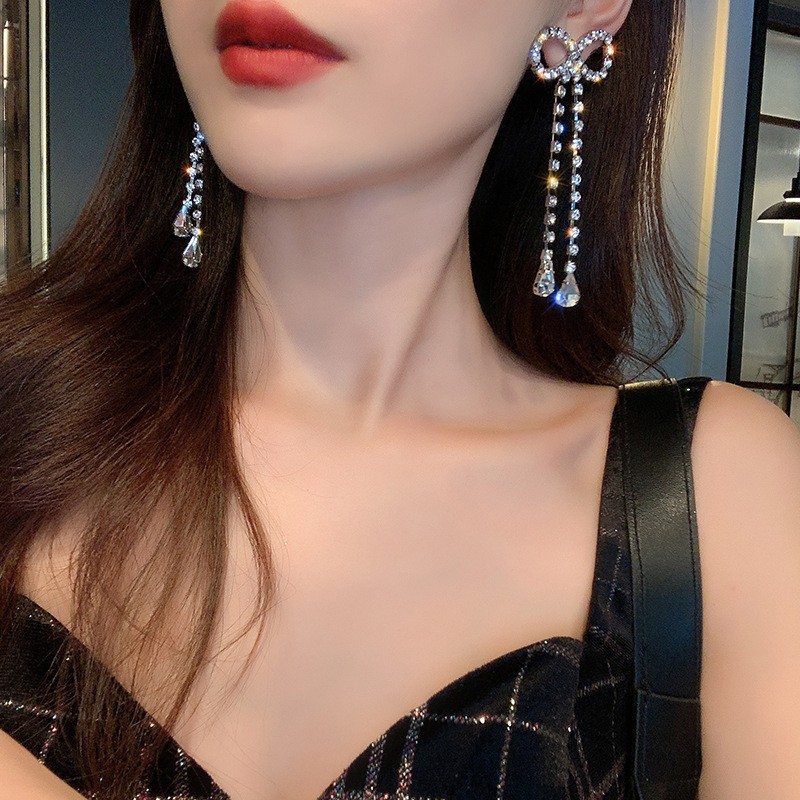 New Korean version bow tassel earrings for autumn and winter, high-end long earrings, exaggerated and elegant stud earrings for women wholesale Application Scenario