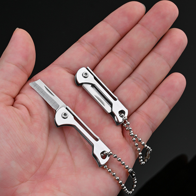 Stainless steel mini folding knife, portable folding knife, keychain pendant, a perfect tool for opening packages undefined