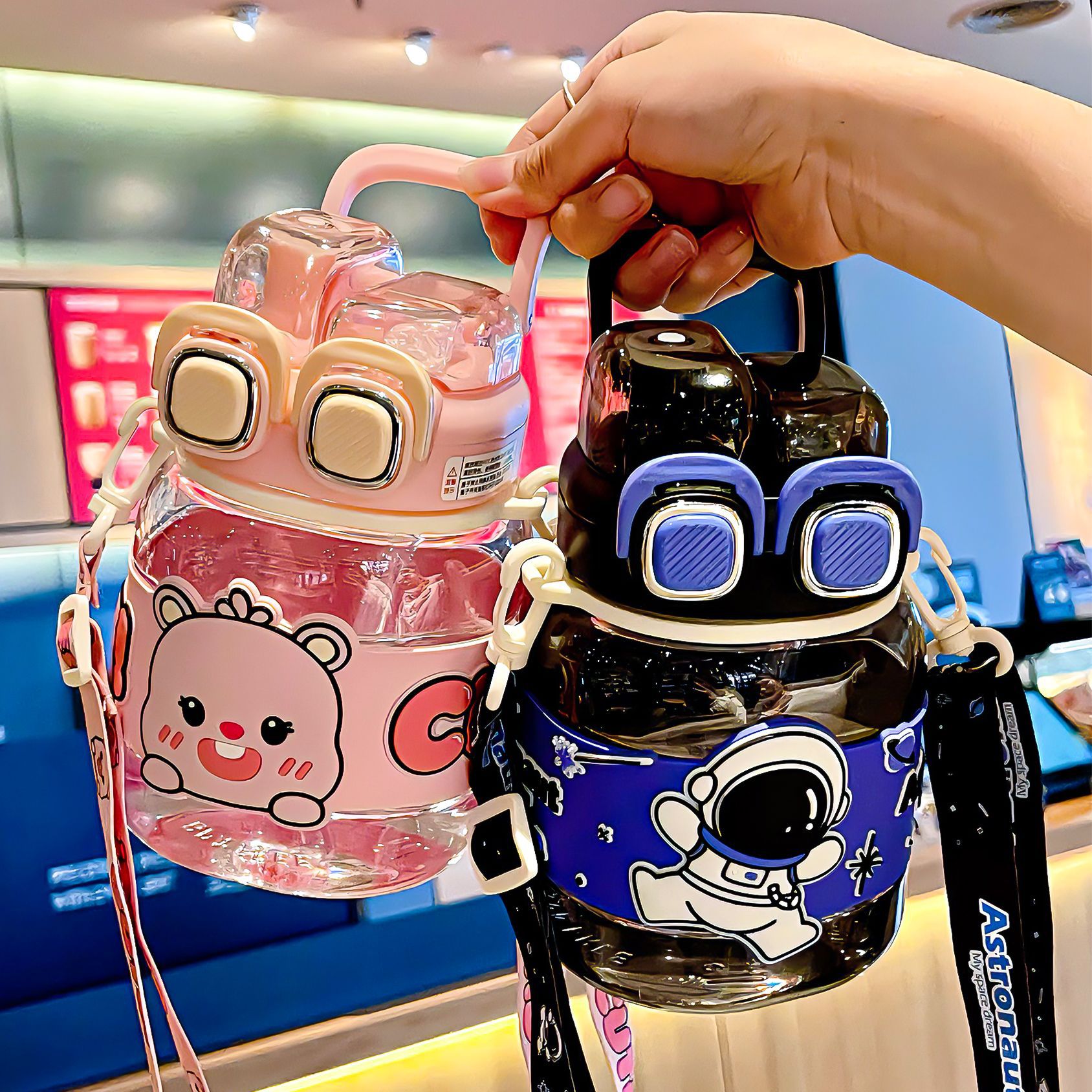 New popular large-belted cups, cute and highly attractive children's water cups, large-capacity girls' convenient straw cups wholesale full figure