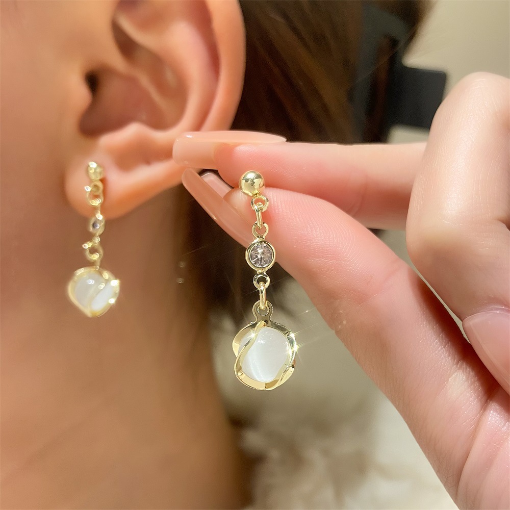 European and American ins cat's eye stone earrings, women's fashionable and elegant long star tassel earrings, creative and popular teardrop earrings full figure
