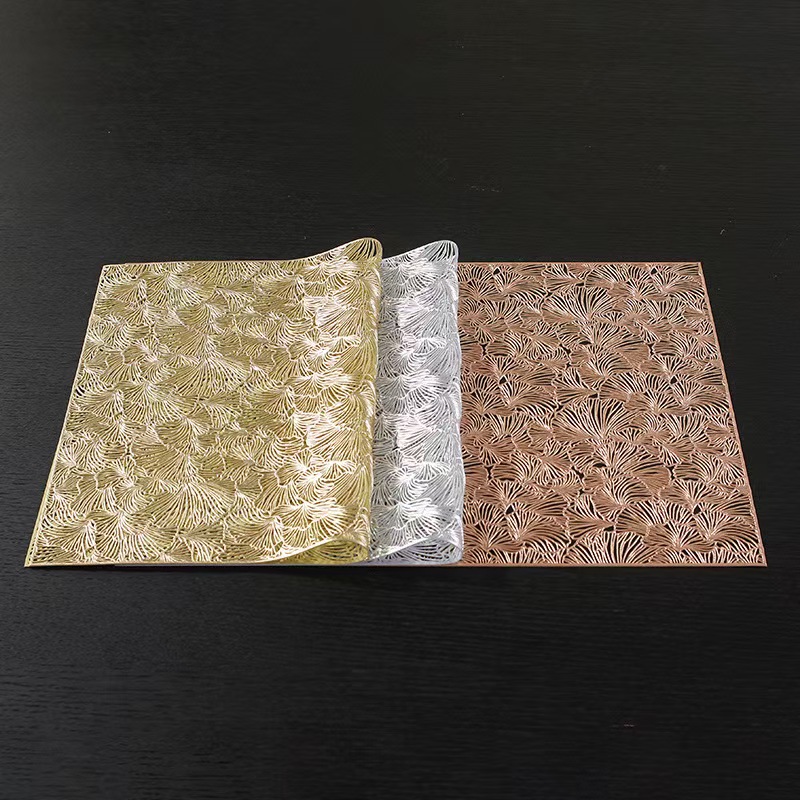 Factory direct sales of Ginkgo leaf hollowed-out placemats, hotel and home decoration, PVC waterproof and wear-resistant placemats, heat insulation pads wholesale details Picture