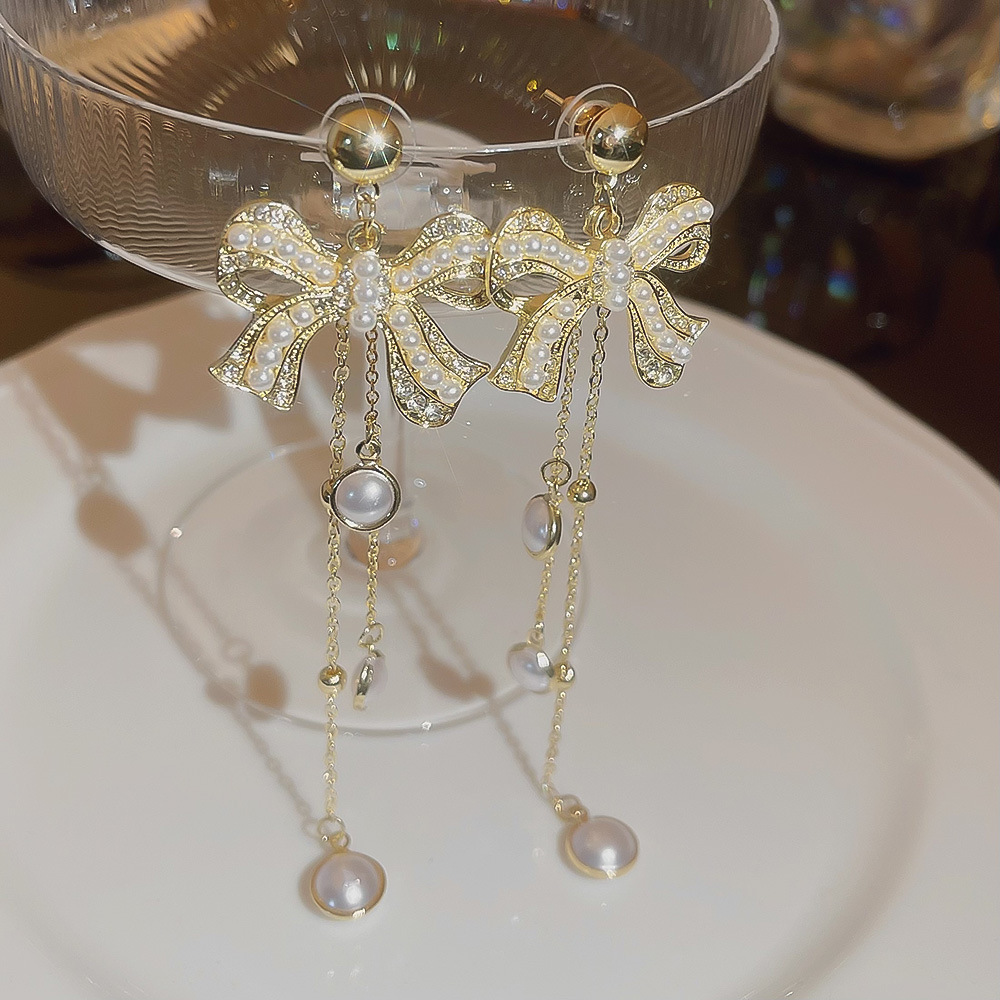 Korean style fashion socialite style pearl full diamond bow earrings with tassels, high-end long and exquisite earrings for women wholesale Specification drawing