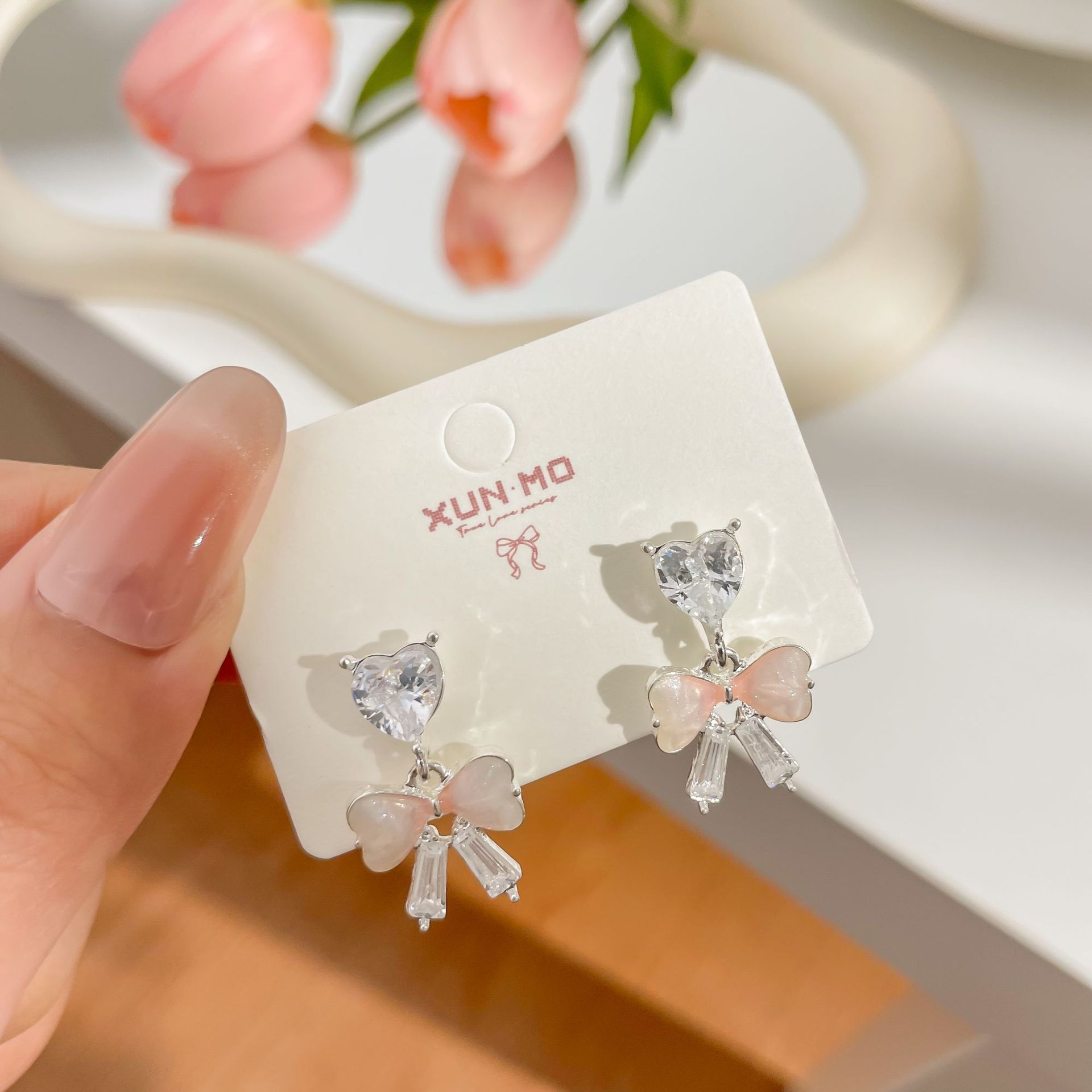 French-style gentle and elegant diamond-encrusted zircon bow stud earrings for women, a light luxury and niche silver needle earrings wholesale details Picture