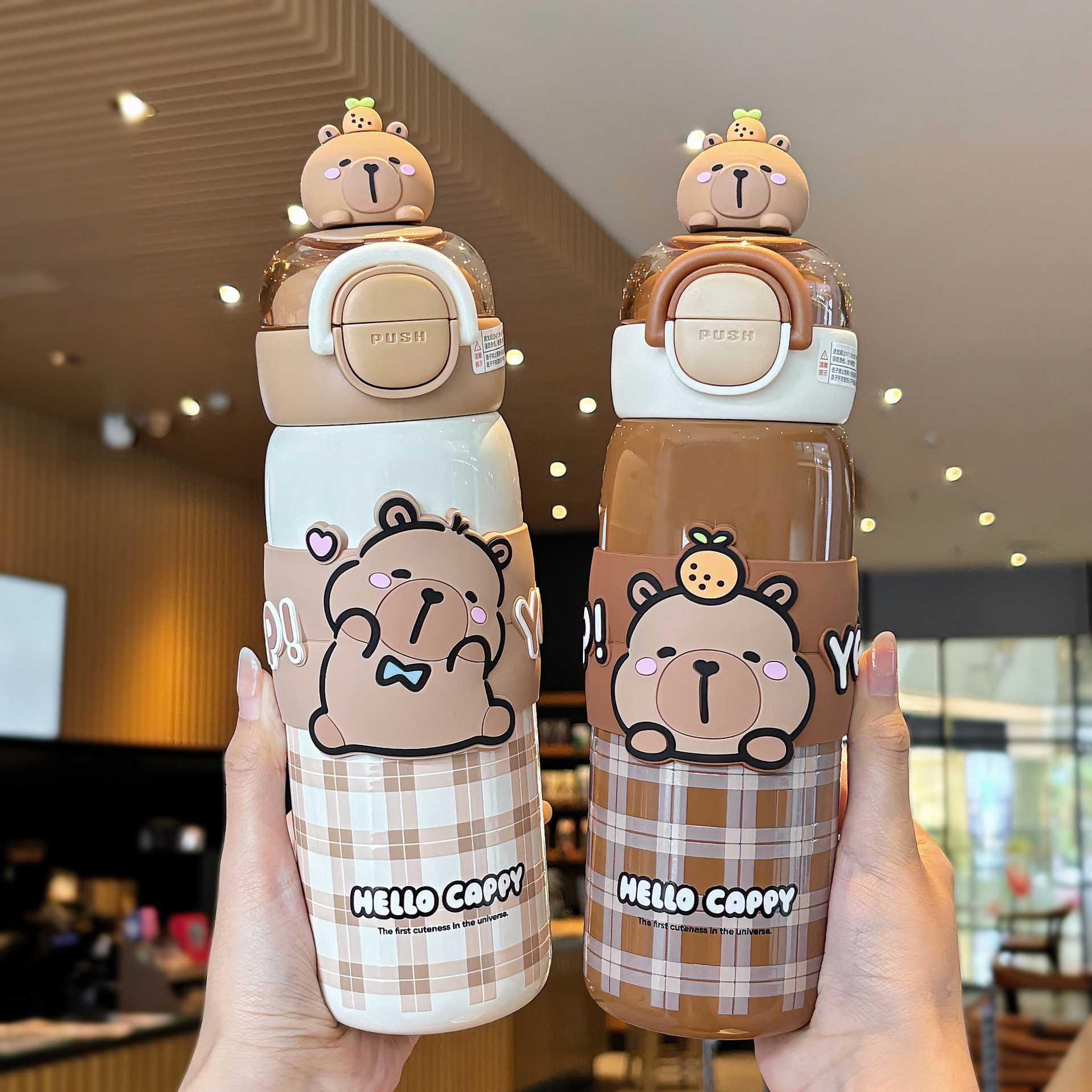 A cute Kapi Barraga-patterned student portable thermos cup with lock design, a double-drinking silicone spout drinking cup full figure