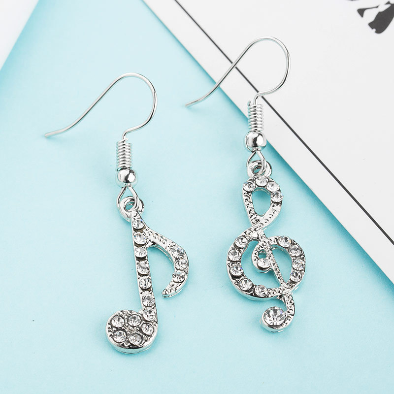 Japanese and Korean popular diamond-encrusted musical note asymmetrical earrings, student girl shining personality music symbol accessories Application Scenario