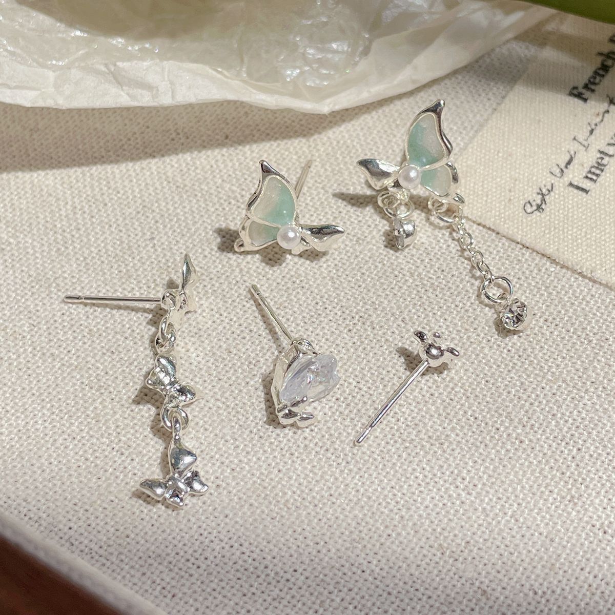 Summer mint Mambo butterfly earrings, women's silver needle, sweet, exquisite, niche, gentle, irregular temperament, ear buckle earrings Application Scenario