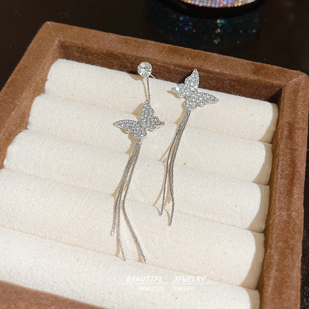 The new Korean-style ultra-sparkling asymmetrical butterfly tassel earrings feature a light luxury and niche design, which is simple and versatile Specification drawing