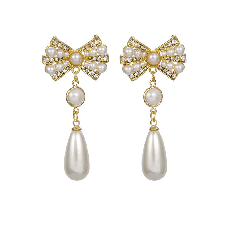 Long tassel pearl earrings, fashionable and elegant lady style, light luxury bow earrings, silver needle high-end earrings, women's wholesale Item Picture