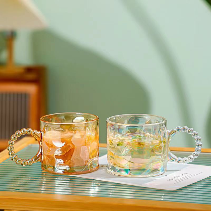 Creative pearl handle cups, large-capacity glass cups, hammer-patterned glass water cups, souvenir cups, gift factory wholesale Application Scenario