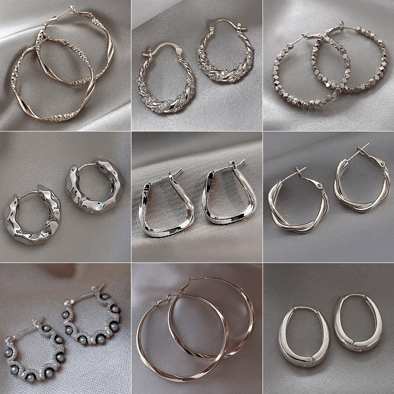 Silver pigment ring earrings, women's light luxury and high-end stud earrings, 2024 new bestseller, niche and exaggerated style stud earrings full figure