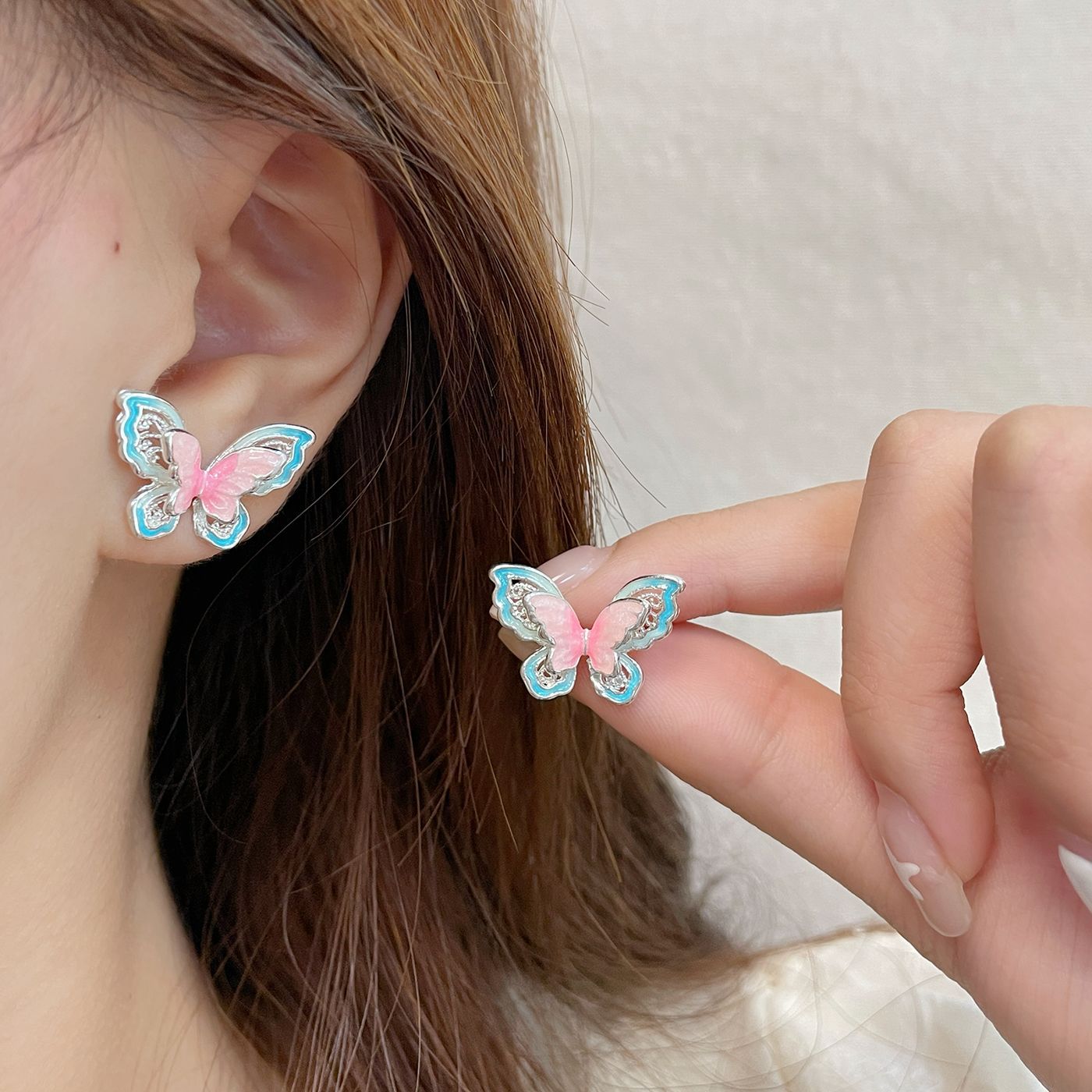 Zhuang Zhou Dream Butterfly Sweet Oil-dripping three-dimensional Hollow butterfly Stud Earrings for Women, 925 silver needle, niche and high-end summer earrings details Picture