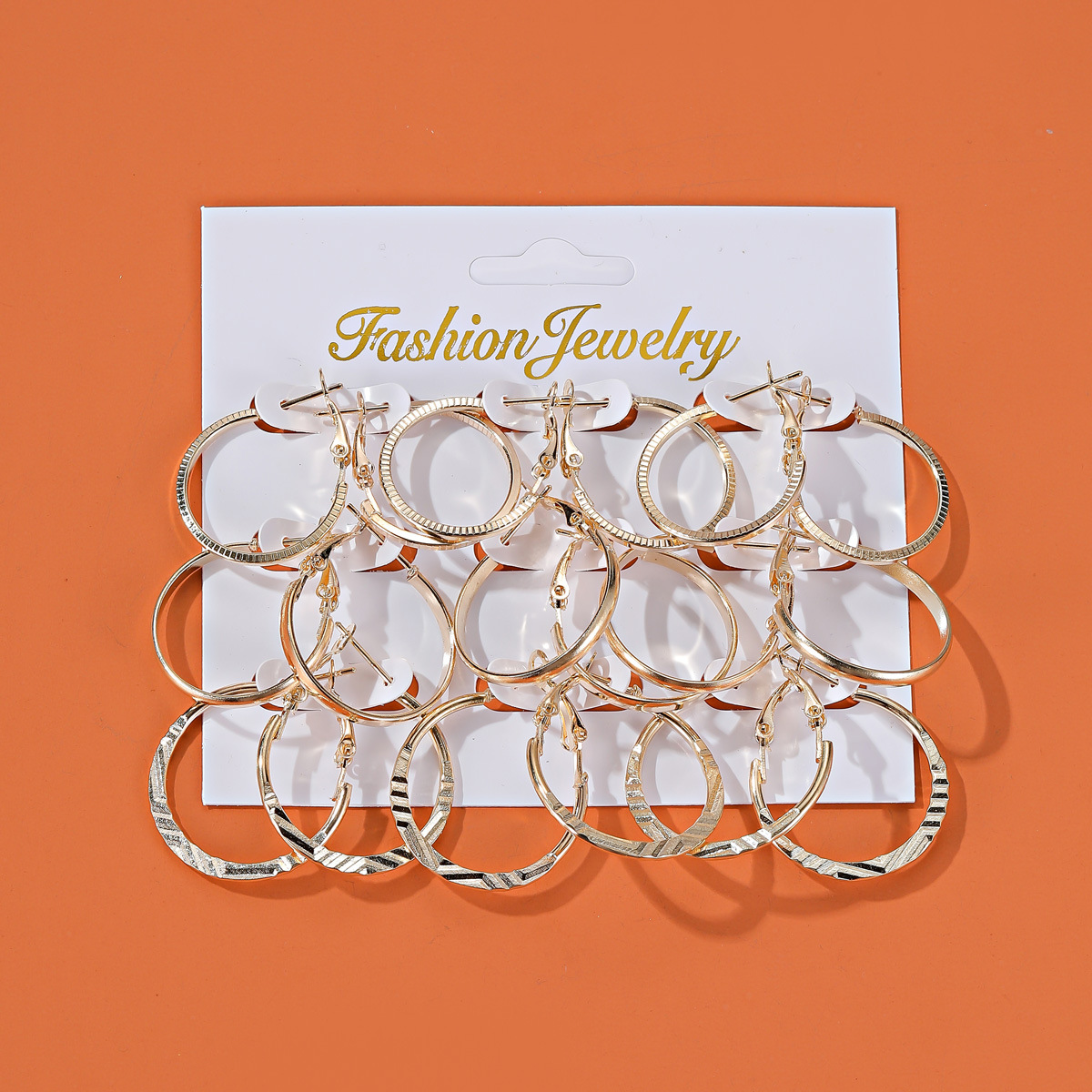 Cross-border best-selling earrings: Simple and versatile circle 9-pair earrings, women's European and American style personalized combination card stud earrings full figure