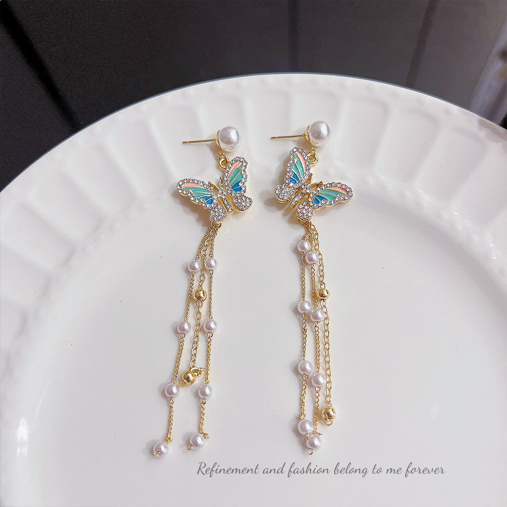 Exaggerated and elegant earrings, fashionable tassel pearl butterfly earrings, summer high-end long exquisite earrings for women wholesale full figure