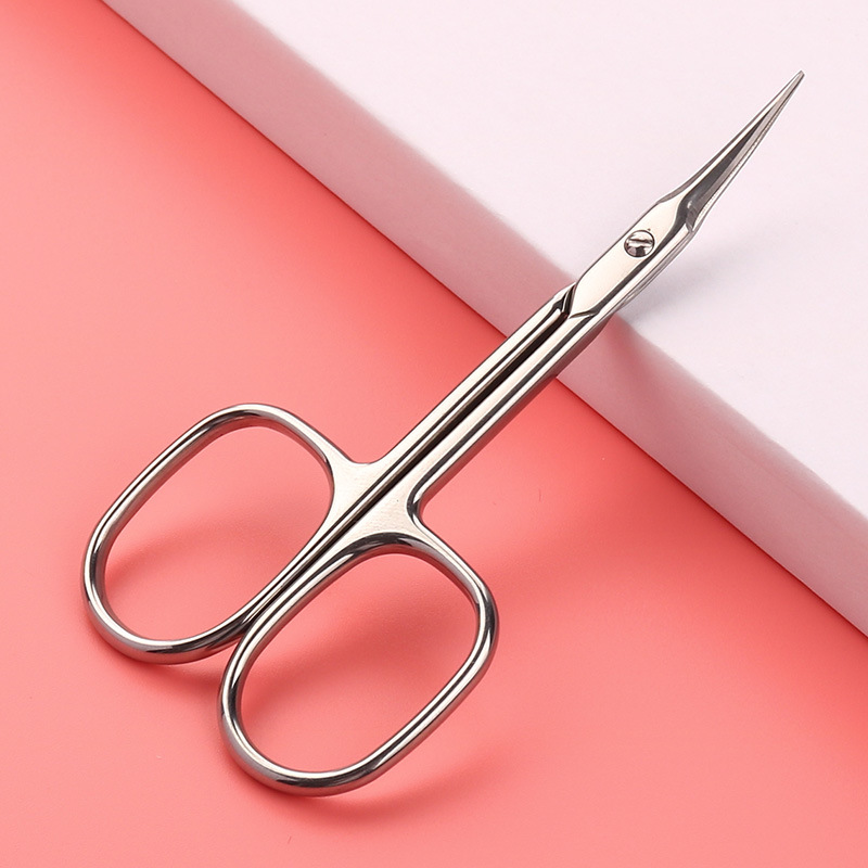 Pointed-tipped dead skin small scissors for beauty, eyebrow shaping, and eyelash trimming. Stainless steel manual, no damage to the elbow, washable details Picture