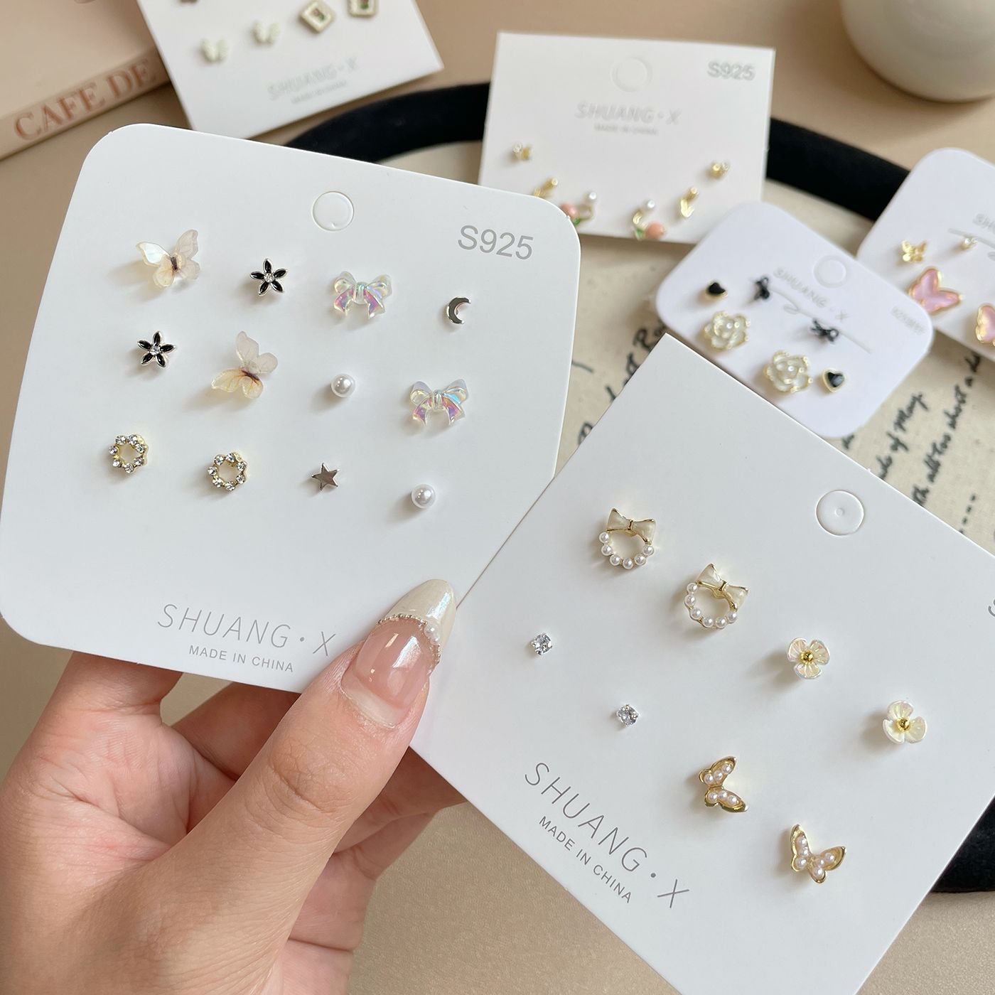 Elegant golden butterfly geometric stud earrings set for women, small and exquisite silver needle, fresh and delicate heart-shaped flower earrings wholesale full figure