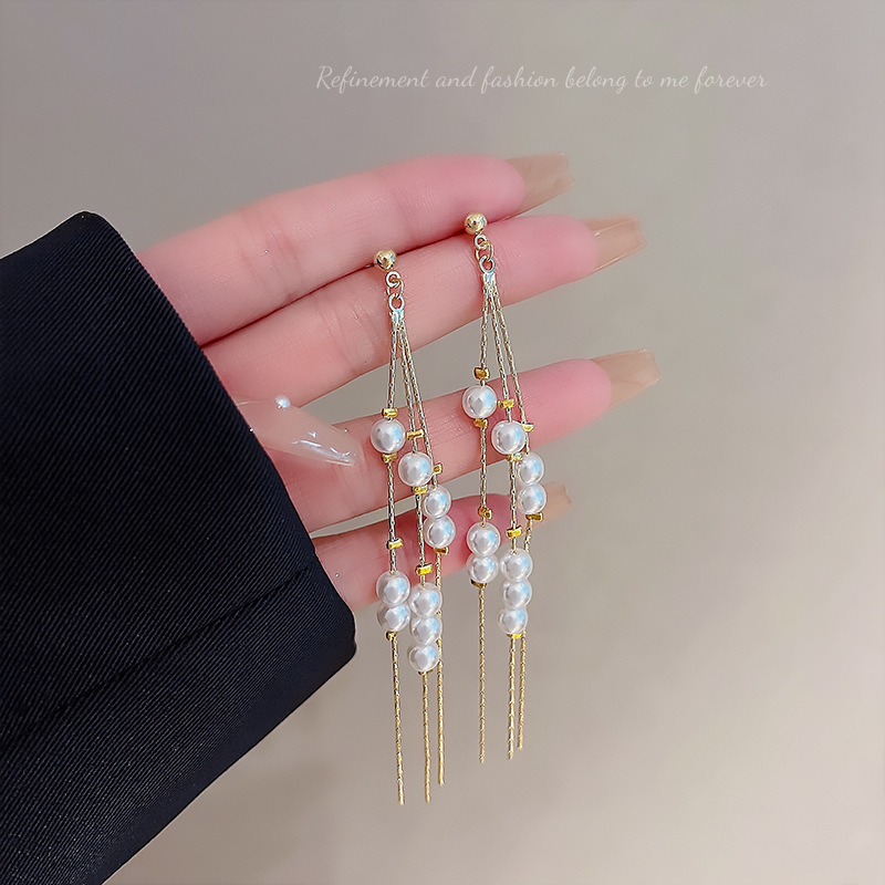 925 Silver needle chain pearl tassel earrings, a long and unique European and American style earring for women, a fashionable and elegant earpiece that has become a social media sensation full figure