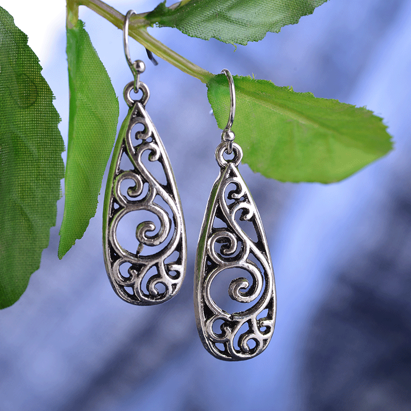 European and American export retro alloy carved court earrings for women, cross-border ethnic style water drop hollowed-out pattern earrings full figure