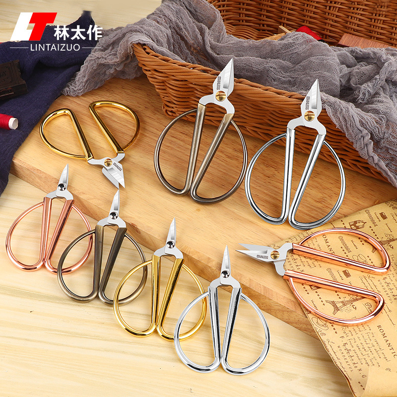 Lin Tai's nail clippers, retro small scissors, pedicure clips, stainless steel thread ends, dragon and phoenix gold toe edge scissors full figure