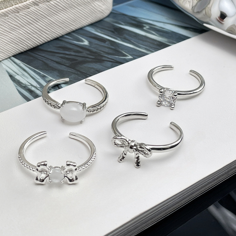 A unique plain ring with an irregular bow and an open ring, exuding a high-end feminine charm, a niche and cold style, and a simple food ring details Picture