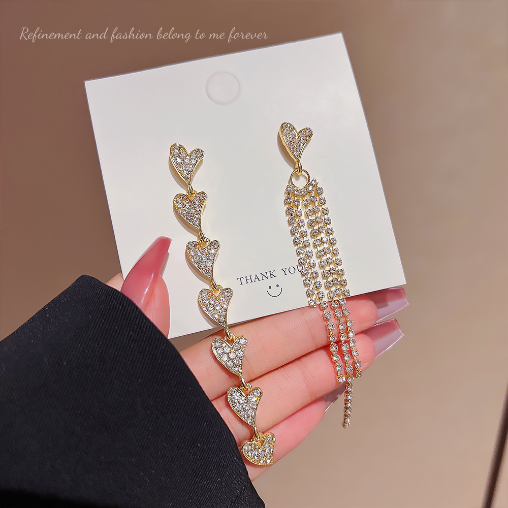 New asymmetrical heart-shaped tassel earrings from South Korea, silver needle high-end earrings, women's fashionable and light luxury full-diamond jewelry full figure