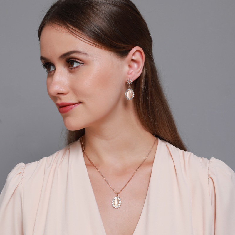Korean-style cat's eye sunflower earrings, French-style micro-inlaid zircon oval necklace, retro lady jewelry details Picture
