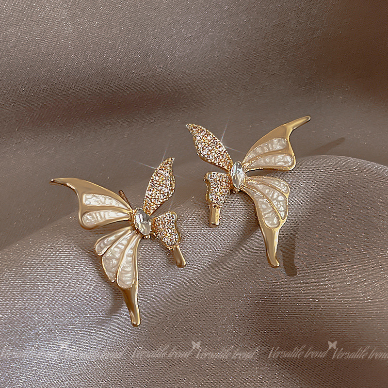 Champagne-colored bow stud earrings, ear clips, no ear holes, high-end and niche design earrings, best-selling internet-famous earrings details Picture